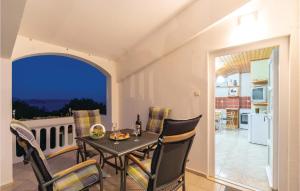 Balkón nebo terasa v ubytování Holiday Home Pelegrin 58