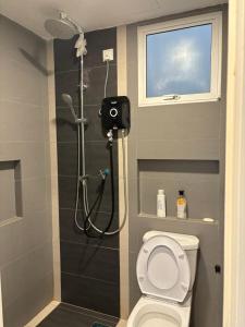 Koupelna v ubytování KF Homestay Premium Suite