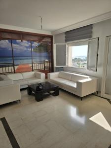 Ένα ή περισσότερα κρεβάτια σε δωμάτιο στο Hammamet 2025