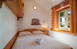 Postel nebo postele na pokoji v ubytování 2 Bedroom Nice Home In Selca