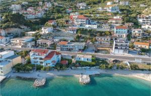 an aerial view of a town with a beach at Three-Bedroom Holiday Home In Suhi Potok in Jesenice