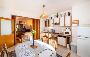 Kuchyň nebo kuchyňský kout v ubytování Apartment In Zadar