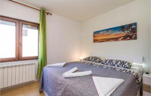 Posteľ alebo postele v izbe v ubytovaní Stunning Apartment In Rijeka