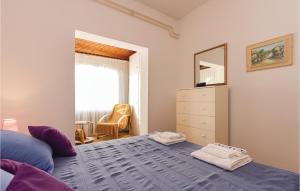 Postel nebo postele na pokoji v ubytování 2 Bedroom Lovely Apartment In Rovinj