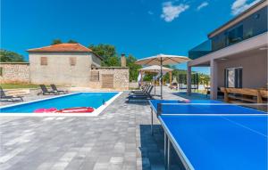 an image of a swimming pool in a house at 4 Bedroom Lovely Home In Donje Rastane in Donje Raštane +39 photos