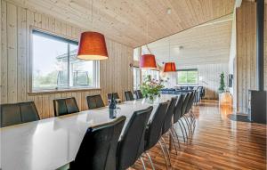 a conference room with a long table and chairs at Awesome Home In Idestrup With Kitchen in Marielyst