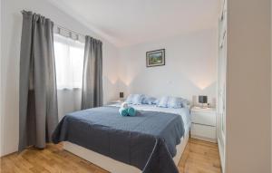 Posteľ alebo postele v izbe v ubytovaní Three-Bedroom Holiday Home In Grubine