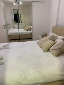 Postel nebo postele na pokoji v ubytování Knebl Apartman