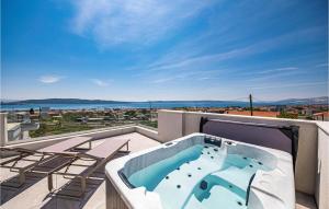 a hot tub on the roof of a building at Amazing Home In Kastel Gomilica in Kaštela