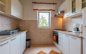 Η κουζίνα ή μικρή κουζίνα στο Holiday Home Risika With Sea View I