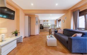 Posezení v ubytování One-Bedroom Apartment In Pula