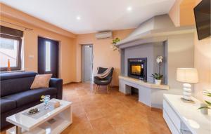 Posezení v ubytování One-Bedroom Apartment In Pula