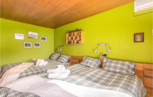 Posteľ alebo postele v izbe v ubytovaní Cozy Home In Miholascica With Wifi
