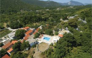 an aerial view of a house on a hill at Holiday Home Kucice Put Povila in Kučiće