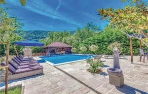 a backyard with a swimming pool and a gazebo at Luxurious Home In Bribir in Bribir +59 photos