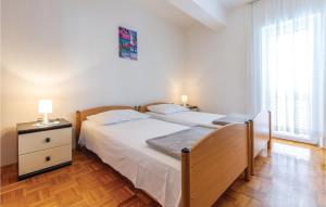 Posteľ alebo postele v izbe v ubytovaní Three-Bedroom Apartment In Plano