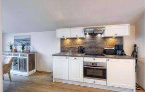 Kuchyň nebo kuchyňský kout v ubytování Baltischer Hof Apartment 63