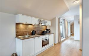 Kuchyň nebo kuchyňský kout v ubytování Baltischer Hof Apartment 63