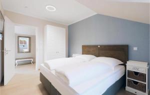 Postel nebo postele na pokoji v ubytování Baltischer Hof Apartment 63