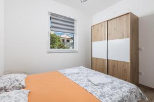 Posteľ alebo postele v izbe v ubytovaní Villa Vuka