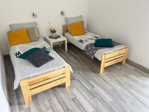 Letto o letti in una camera di Prázdninový dům