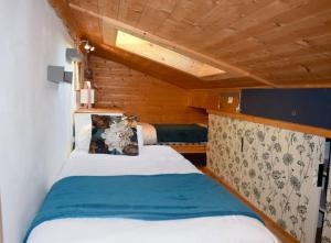 Posteľ alebo postele v izbe v ubytovaní Appartement cosy avec lits faits à l'arrivée