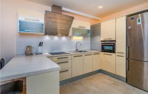 Køkken eller tekøkken på Stunning Apartment In Moscenicka Draga