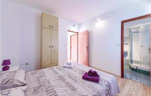 Posteľ alebo postele v izbe v ubytovaní Three-Bedroom Holiday Home In Valtura