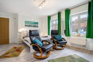 Afbeelding uit fotogalerij van Bäckerhus - Ferienwohnung 5 in Wiek auf Rügen  +13 foto's