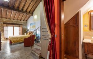 A bed or beds in a room at Amazing Home In Mazzolla With Wifi