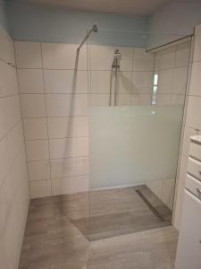 Ένα μπάνιο στο Ferienwohnung Carstens