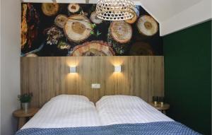 Een bed of bedden in een kamer bij Houtsnip