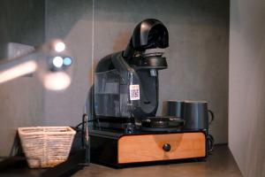 a coffee maker sitting on top of a table at Ferienwohnung Schlossblick in Neuwied