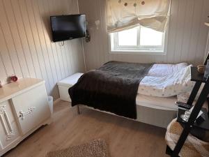 Postel nebo postele na pokoji v ubytování Stor enebolig Trondheim syd