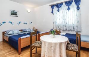 Posteľ alebo postele v izbe v ubytovaní Holiday Apartment Omis 07