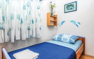 Posteľ alebo postele v izbe v ubytovaní Holiday Apartment Omis 07