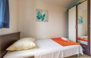 Postel nebo postele na pokoji v ubytování Apartment Sibenska Vi