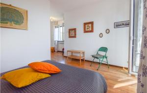 A bed or beds in a room at Stunning Home In Celle Ligure Sv,