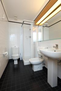 Koupelna v ubytování Hotel Genova