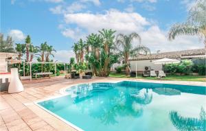 The swimming pool at or close to 4 Bedroom Stunning Home In Arenella