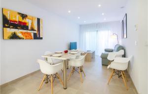 A seating area at 3 Bedroom Cozy Apartment In Denia
