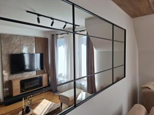 تلفاز و/أو أجهزة ترفيهية في Apartman MagicD