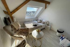 Χώρος καθιστικού στο Esprit Palace, coeur de Mulhouse