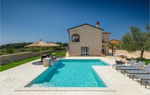 a swimming pool in front of a villa at Villa Piccolo Paradiso in Rovinj