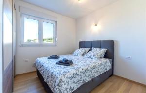 Posteľ alebo postele v izbe v ubytovaní 2 Bedroom Stunning Apartment In Solin