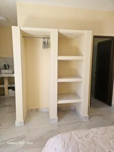 Postel nebo postele na pokoji v ubytování Departamentos Quinto Sol