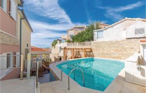 a swimming pool in front of a building at Holiday Home Bok in Zaglavice +36 photos