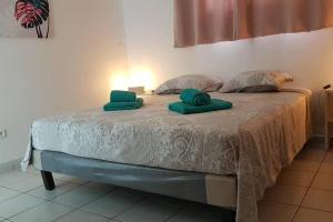 Voodi või voodid majutusasutuse Anse à l'Ane - Spacieux T2 - Vue d'exception toas