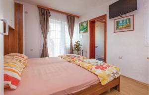 Ein Bett oder Betten in einem Zimmer der Unterkunft Awesome Apartment In Crikvenica
