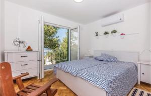 Ένα ή περισσότερα κρεβάτια σε δωμάτιο στο 3 Bedroom Stunning Home In Crikvenica